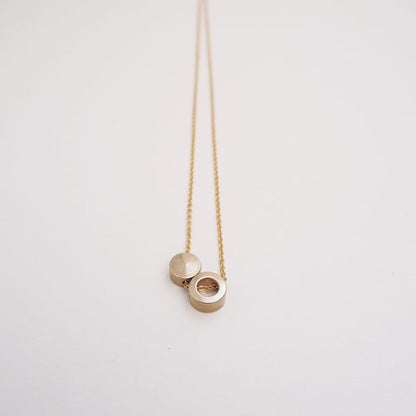 LIM/08 less is more brass ring+disc necklace